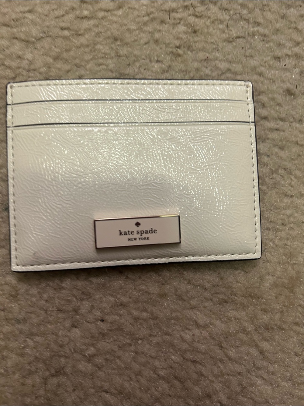 NWOT KATE SPADE card case.